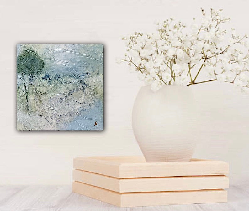 Acrylic painting on panel. insitu of an olive tree thriving alone, by Juanita Bellavance