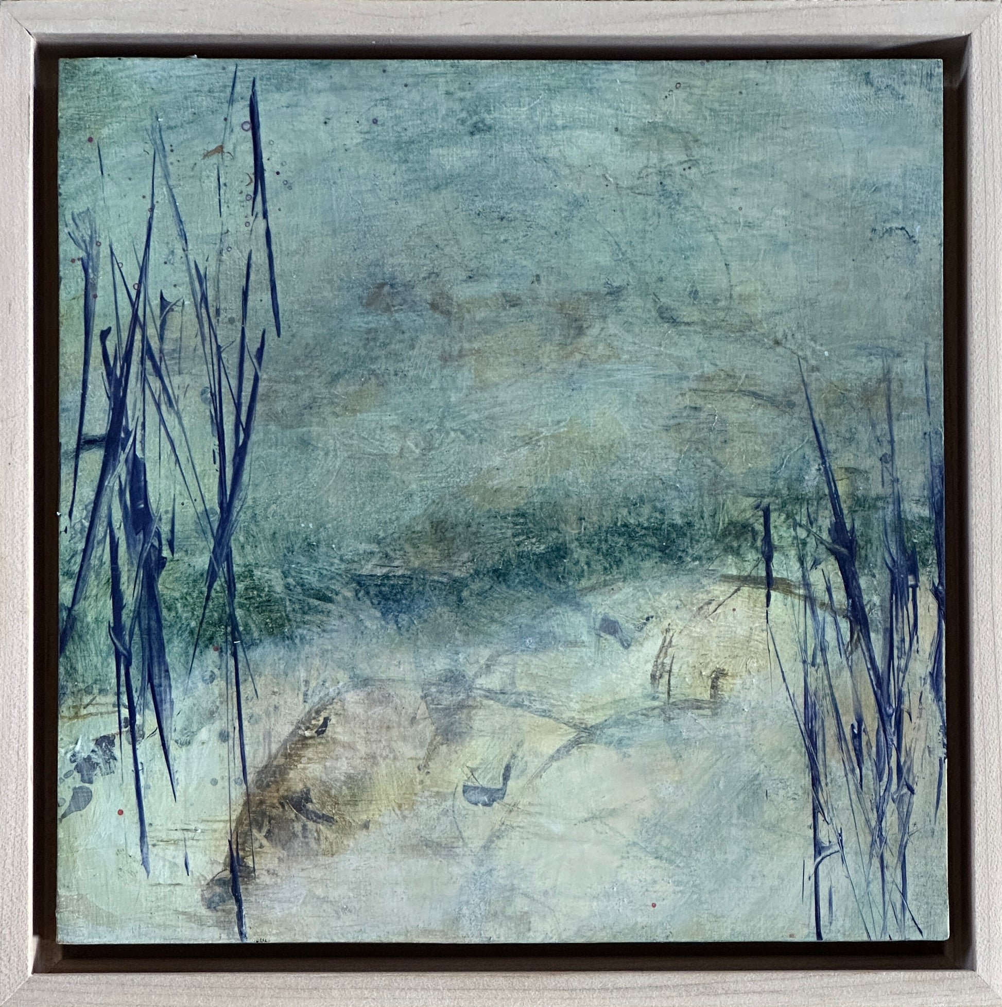 8 x 8 x 1.5-inch, framed, impression of water lapping over sand creating a gradual shift from water to sand, merging the two. Acrylic painting on cradled panel with natural wood frame.  By Cumming, GA artist, Juanita Bellavance. Part of our 25 Days of Minis 2022 collection.  Collect them all!