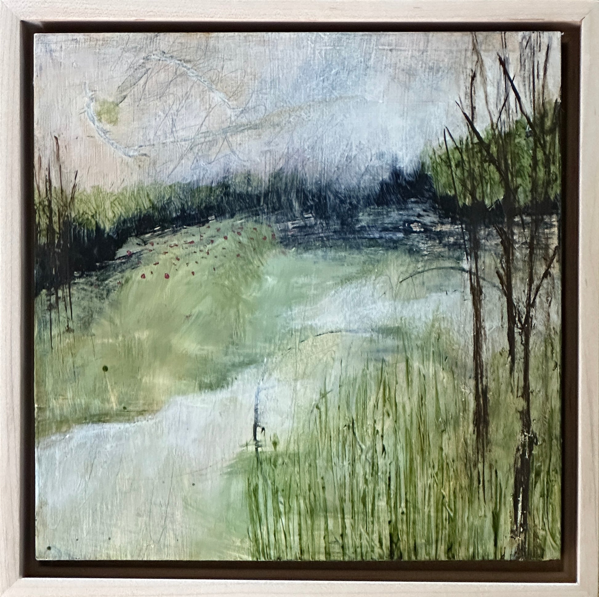 8 x 8-inch, framed, impressionist scene of a distant river with the impression of Spring juxtaposed with winter trees in the foreground.  Acrylic painting on cradled panel with natural wood frame.  By Cumming, GA artist, Juanita Bellavance. Part of our 25 Days of Minis 2022 collection.  Collect them all!